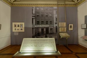 The memorial plate for Moses Mendelssohn from 1829 and a picture of his house. Moses Mendelssohn was a leading cultural figure of the time, the father of Jewish Enlightenment.